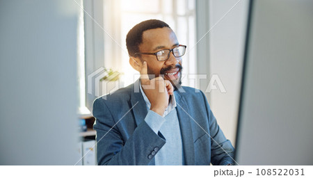 Thinking, computer and businessman working in the office doing research for a legal project. Technology, proud and professional African male attorney planning for a law case in the modern workplace. 108522031
