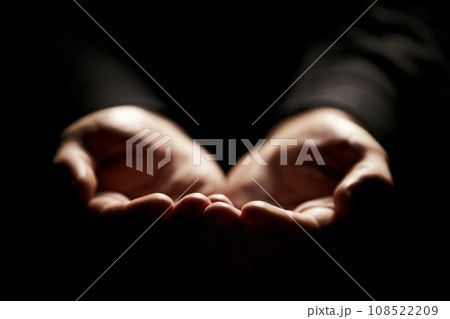 Hands, prayer and help from God with charity, closeup and praise with giving, gratitude and respect for religion. Search for guidance, wellness and praying, worship and faith with person and trust 108522209