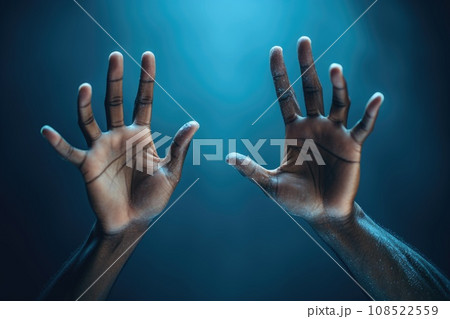 Two hands on a blue background 108522559