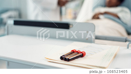 Blood test, glass vial and documents in hospital for surgery, medical research and health for patient in bed. Doctor, medic and sick person in closeup for dna sample, folder or analysis for leukemia 108523405