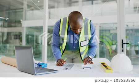 Architecture, man and calculator for blueprint planning. ratio check and numbers or project development in office. African designer or engineering worker for floor plan strategy, sketch or statistics Architecture, man and calculator for blueprint planning. ratio check and numbers or project development in office. African designer or engineering worker for floor plan strategy, sketch or statistics 108523866