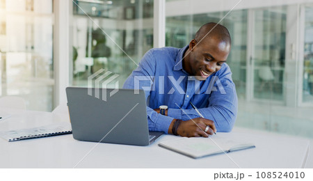 Business man, writing and planning on computer for financial career notes, information and reminder in office. Professional african accountant on laptop and notebook for happy ideas and brainstorming 108524010
