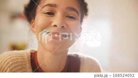 Happy, smile and face of a woman at her home with a sweet, positive and confident personality. Happiness, excited and headshot portrait of a calm young female person alone in her modern apartment. 108524052