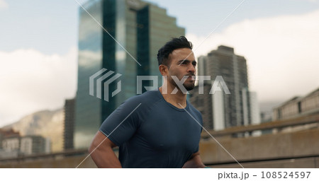 Workout, running and a sports man in the city for cardio training to improve fitness for a marathon. Wellness, exercise or health with a young runner or athlete in an urban town for a speed challenge Workout, running and a sports man in the city for cardio training to improve fitness for a marathon. Wellness, exercise or health with a young runner or athlete in an urban town for a speed challenge 108524597