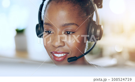 African woman, call center and talk for contact us, microphone and voip tech for telemarketing sales. Consultant, thinking and customer service agent with reading, headphones and advice at help desk 108524719