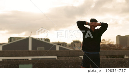 Man, runner and success view in city training victory, fitness progress or cloudy morning cardio. Male person, athlete or relax arms or achievement workout performance, exercise goal or challenge win 108524737