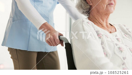 Nurse, senior woman and push wheelchair with helping hand, care and support for rehabilitation in clinic. Medic, elderly person with disability and mobility with empathy, kindness and retirement 108525261