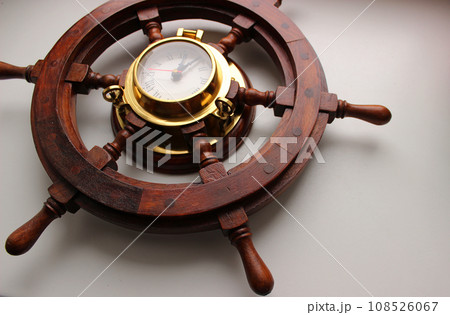 Yacht Steering Wheel With Arrow Clock In Copper Edging Angle View Stock Photo 108526067