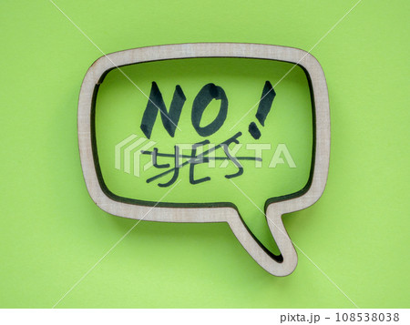 Learn to say no concept. Wooden speech bubble with and crossed out Yes. 108538038