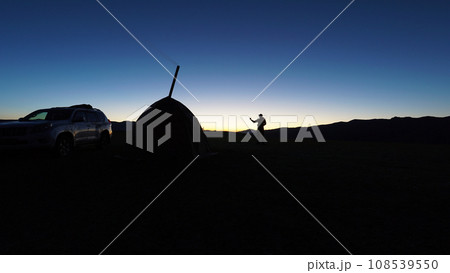 Sunrise among green fields and hills. Camping Sunrise among green fields and hills. Camping 108539550