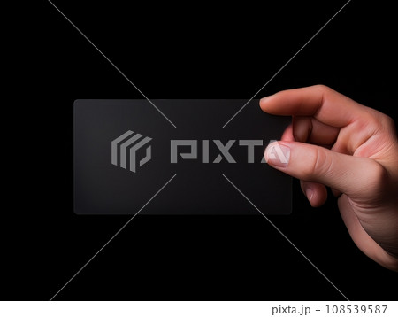 Male hand holding a black bank card on a black background AI Male hand holding a black bank card on a black background AI 108539587
