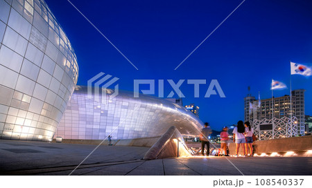 Modern architecture of Dongdaemun Design Plaza or DDP at night, the famous Moderness landmark of Seoul, South Korea. Modern architecture of Dongdaemun Design Plaza or DDP at night, the famous Moderness landmark of Seoul, South Korea. 108540337
