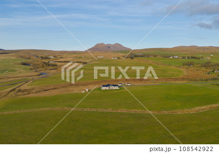 Aerial top view of houses or hotel with mountains in Iceland islands in the summer season, Europe hills, nature landscape background. 108542922