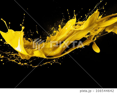 yellow paint splash on black background yellow paint splash on black background 108544642