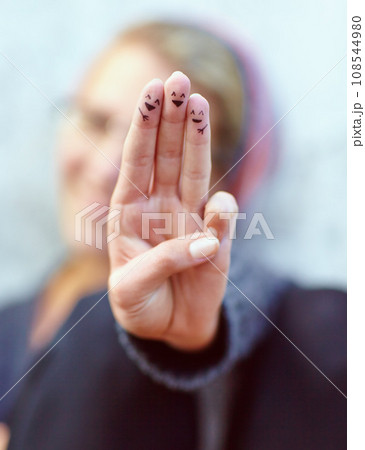 Fingers, smiley and happy drawing on hand, woman and symbol or emoji, sign and icon or fun art. Emoticon, expression and artistic or cool, creative and craft for aesthetic, hope and joy in tattoo Fingers, smiley and happy drawing on hand, woman and symbol or emoji, sign and icon or fun art. Emoticon, expression and artistic or cool, creative and craft for aesthetic, hope and joy in tattoo 108544980
