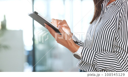 Business person, hands scroll and tablet for information, human resources software and office management. Professional worker or HR employee working on digital technology for job or company research 108545129