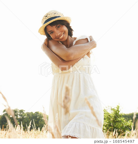Portrait, field and woman with self love, hug and summer with happiness, sunshine and relax. Person, outdoor and girl with nature, grass and eco friendly with weekend break and embrace with a smile Portrait, field and woman with self love, hug and summer with happiness, sunshine and relax. Person, outdoor and girl with nature, grass and eco friendly with weekend break and embrace with a smile 108545497