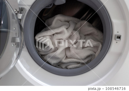 Used towel in washing machine Used towel in washing machine 108546716