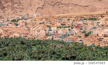 Tinghir, sometimes known as Tinerhir, is a city in Morocco, nestled in the High Atlas Mountains. It's known for its scenic beauty, with lush green oases and the Todgha Gorge Tinghir, sometimes known as Tinerhir, is a city in Morocco, nestled in the High Atlas Mountains. It's known for its scenic beauty, with lush green oases and the Todgha Gorge 108547083