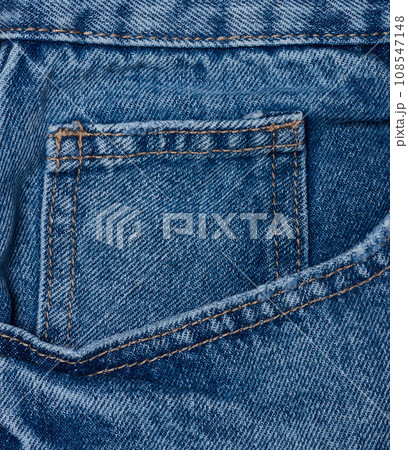Blue jeans front pocket with buttons, close up 108547148