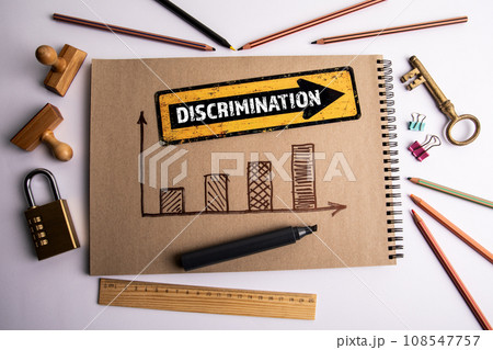 Discrimination Concept. Direction arrow and chart on office desk 108547757
