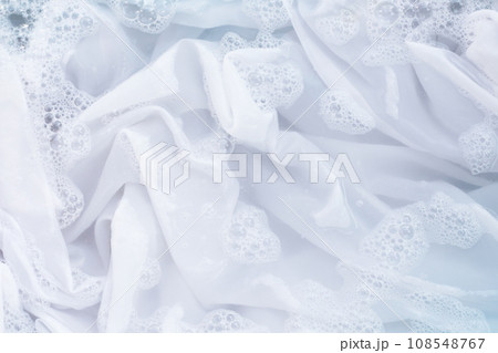 Soak a cloth before washing, white cloth 108548767
