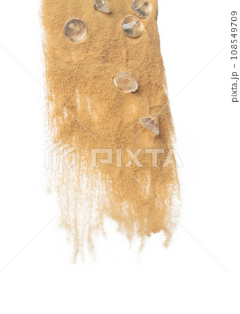 Diamond crystal fly splashing in mid air. Diamond precious stone explosion flying with sand powder dust under dry sun. White background isolated high speed shutter freeze motion Diamond crystal fly splashing in mid air. Diamond precious stone explosion flying with sand powder dust under dry sun. White background isolated high speed shutter freeze motion 108549709