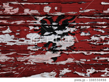 Flag of Albania painted on a wooden board Flag of Albania painted on a wooden board 108550498