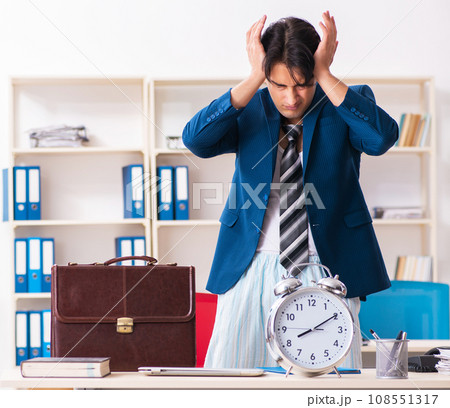 Employee coming to work straight from bed Employee coming to work straight from bed 108551317