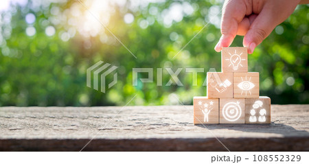 Excellance concept, Man hand holding wooden block with excellance icon on virtual screen, Customer Experience, Satisfaction. 108552329