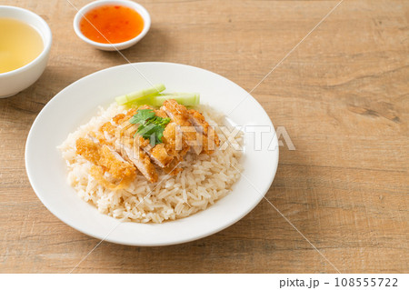 Steamed Rice with Fried Chicken or Hainanese Chicken Rice 108555722