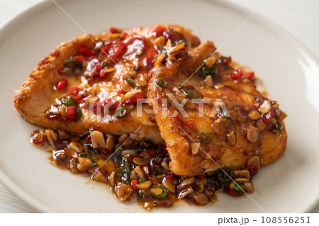Fried Snapper Belly with Spicy Garlic Soy Sauce Fried Snapper Belly with Spicy Garlic Soy Sauce 108556251