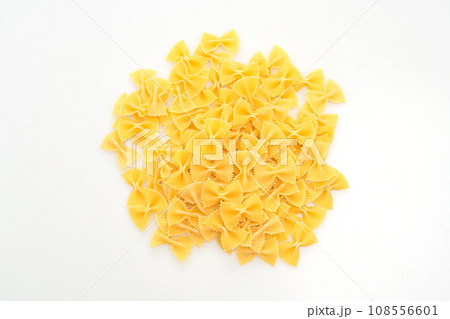 Dry uncooked farfalle pasta on white background 108556601