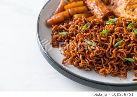 Jajangmyeon or JJajangmyeon with Odeng and Omuk - Korean Instant noodles with Korean fish cake in black bean sauce 108556751