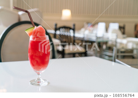 fresh watermelon smoothie glass  on table 108556764