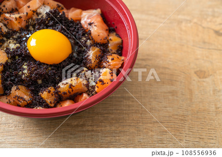 Japanese Rice with Fresh Salmon Raw, Tobiko and Egg (Salmon Don) Japanese Rice with Fresh Salmon Raw, Tobiko and Egg (Salmon Don) 108556936