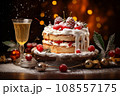 christmas cake with berries and chocolate bokeh background 108557175