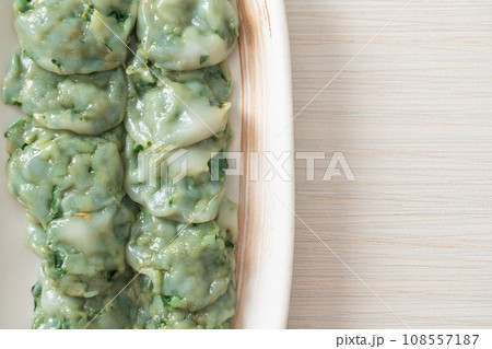 steamed chives dumplings with sauce steamed chives dumplings with sauce 108557187