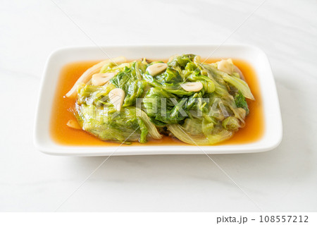 Stir fried Iceberg lettuce with Oyster sauce Stir fried Iceberg lettuce with Oyster sauce 108557212