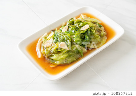 Stir fried Iceberg lettuce with Oyster sauce Stir fried Iceberg lettuce with Oyster sauce 108557213