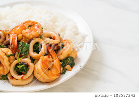 rice and stir-fried seafood with Thai basil rice and stir-fried seafood with Thai basil 108557242