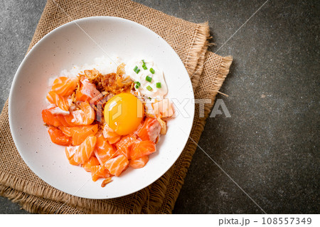 Japanese rice with fresh salmon raw and egg Japanese rice with fresh salmon raw and egg 108557349