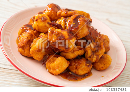 fried meatballs with spicy dipping sauce fried meatballs with spicy dipping sauce 108557481