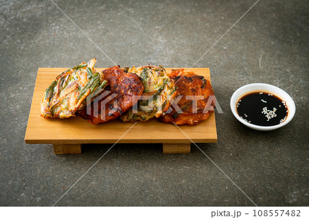 Pajeon or Korean pancake and Korean Kimchi pancake or Kimchijeon on white background Pajeon or Korean pancake and Korean Kimchi pancake or Kimchijeon on white background 108557482