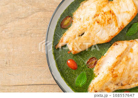 grilled chicken steak with pesto sauce grilled chicken steak with pesto sauce 108557647