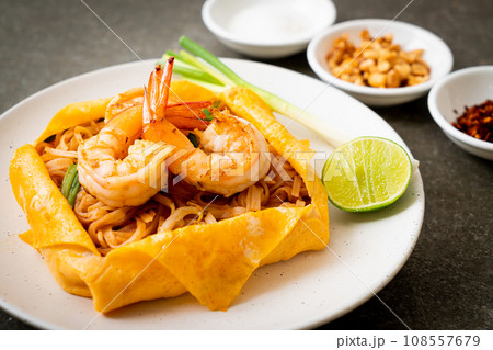 Thai stir fried noodles with shrimps and egg wrap (Pad Thai) Thai stir fried noodles with shrimps and egg wrap (Pad Thai) 108557679