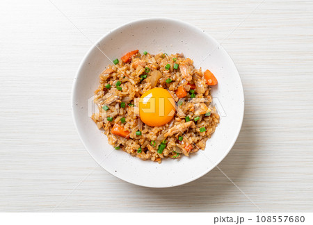 salmon fried rice with pickled egg on top salmon fried rice with pickled egg on top 108557680