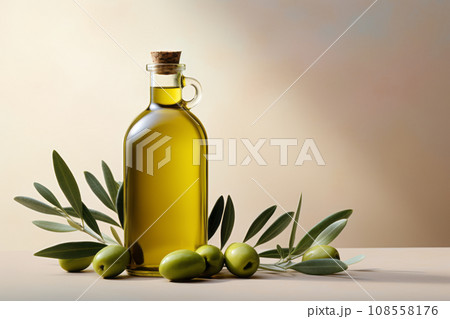 Bottle of olive oil and green olives with leaves on light background Bottle of olive oil and green olives with leaves on light background 108558176