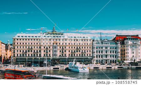 Stockholm, Sweden Traffic With Cars And Buses. Grand Hotel Locat Stockholm, Sweden Traffic With Cars And Buses. Grand Hotel Locat 108558745