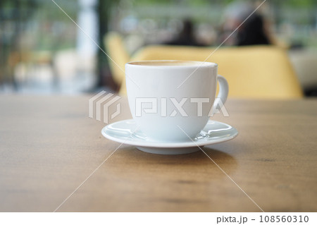 late coffee on cafe table at cafe background  108560310